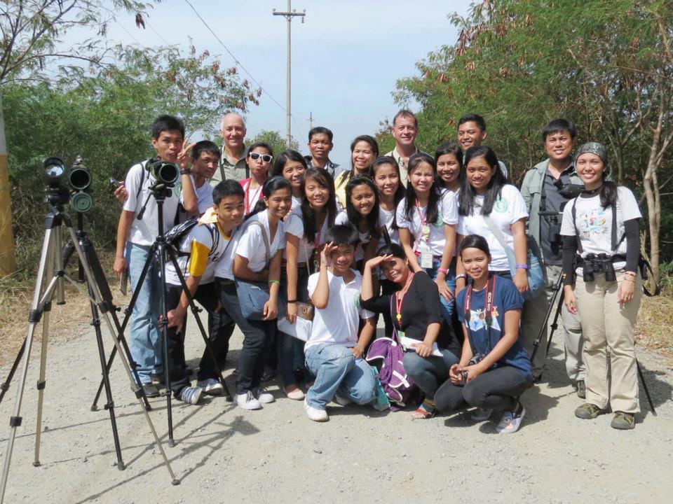 Guided morning birdwatching for students at LLPCHEA. Photo by Jasmin Meren.