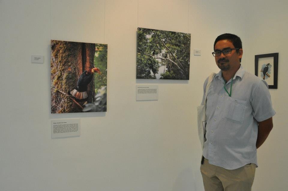 Mr. Ivan Sarenas with his field photo of one of the world's rarest hornbill -Sulu hornbill and Walden's hornbil. Photo by Anthony Arbias.