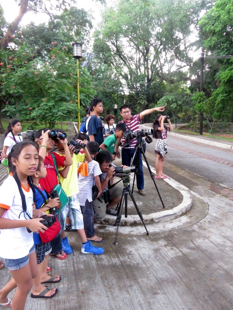 Birding with the children under He Cares Foundation. Photo by Maia Tanedo.