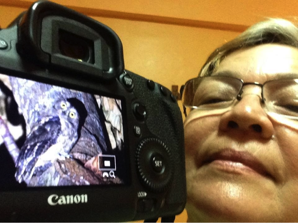 One of the 7 Stooges, Ixi showing off her photo of the Ryukyu Scops Owl. Photo selfie by Ixi Mapua.