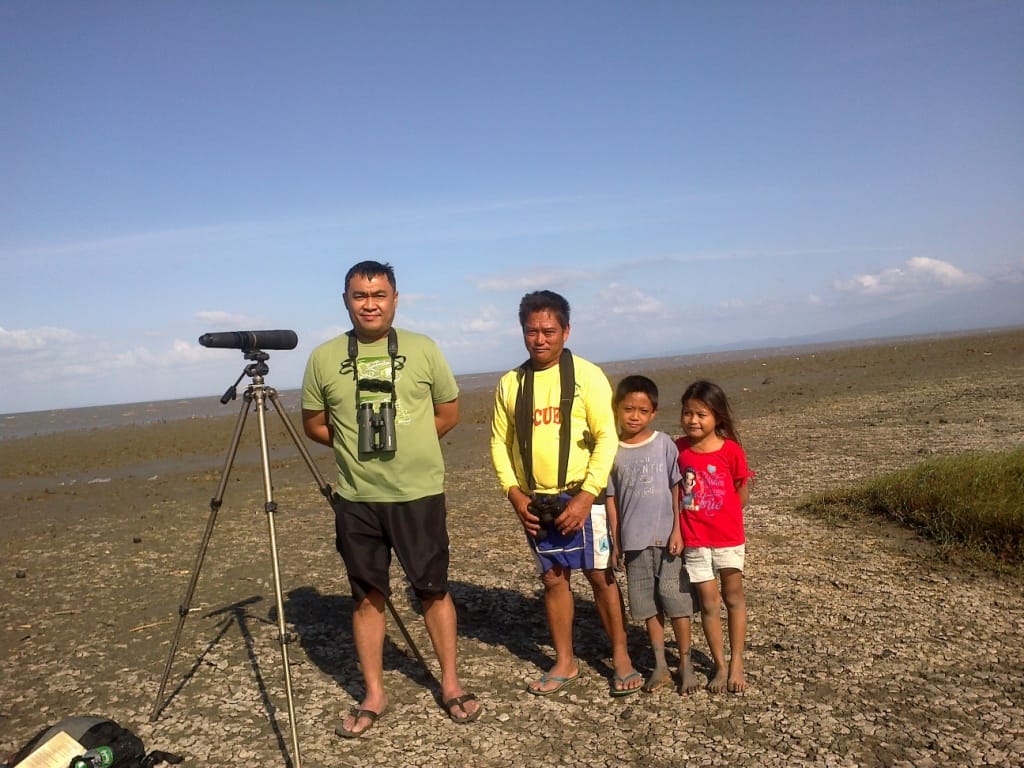 WBCP member Felix Servita with the Cabusao Wetlands warden Frederico Maravilla and kids. Photo from Felix Servita