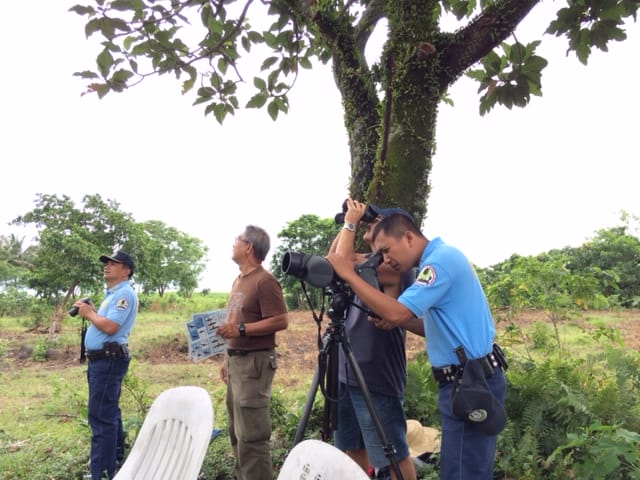 The Chief of Police of Pagudpud and his team watching raptors for the first time